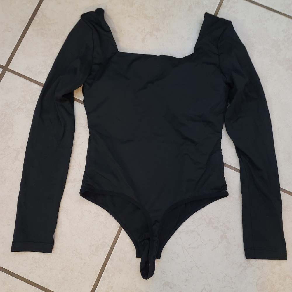 Long sleeve black body suit must have!!